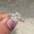 Princess cut moissanite engagement ring.
