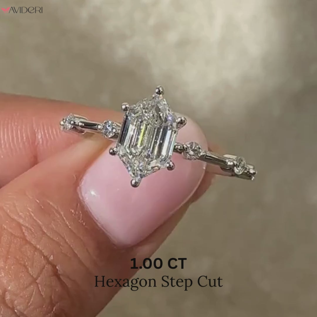 Round cut side stone with lab-grown diamond ring.