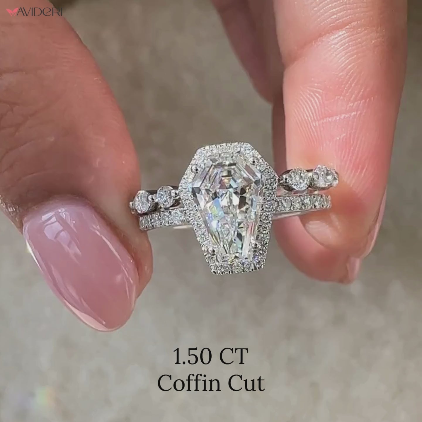 Shared prong wedding band on round cut pave band ring.