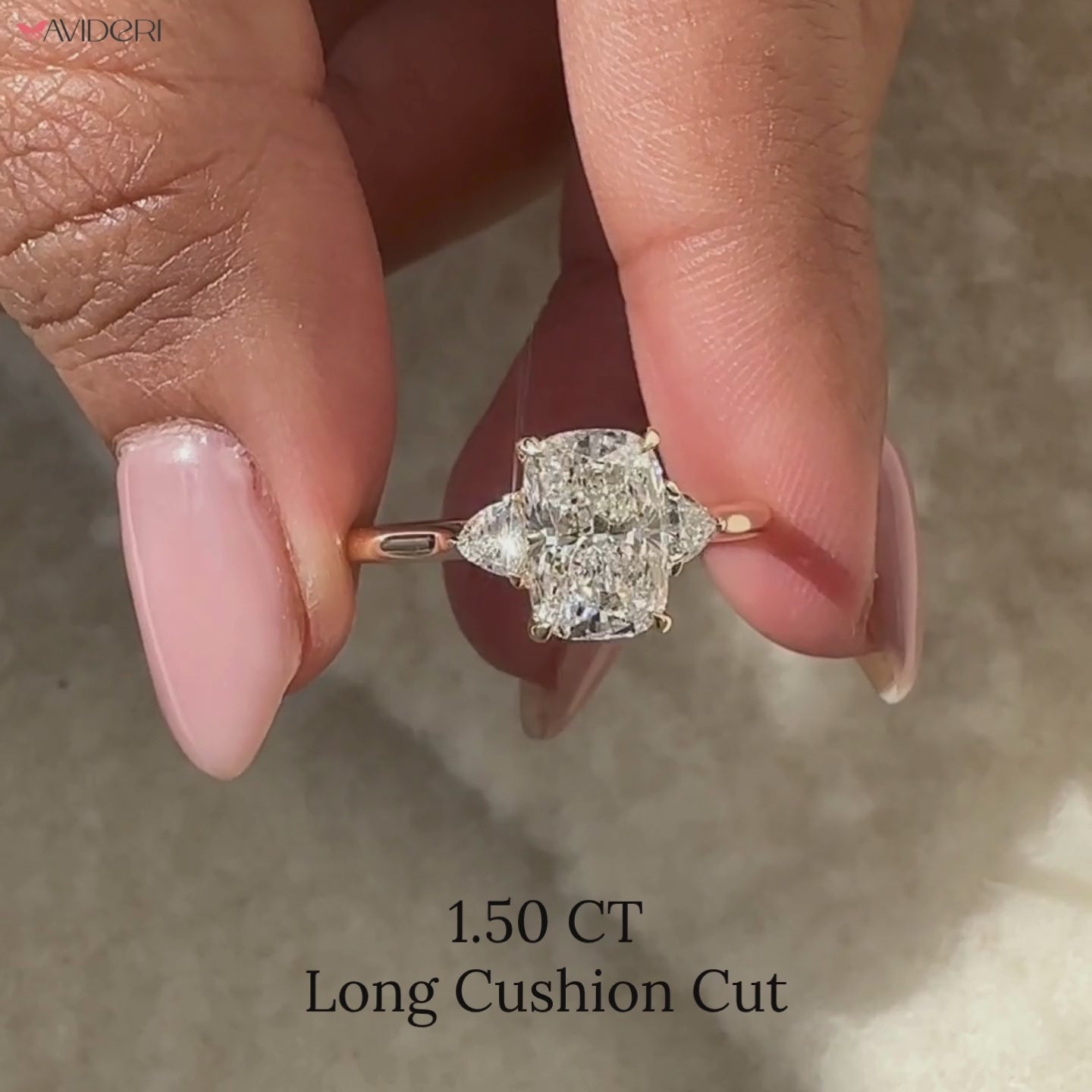 Elegant Avideri three stone diamond ring.