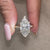 Gift for her – marquise and round diamond ring in classic style.