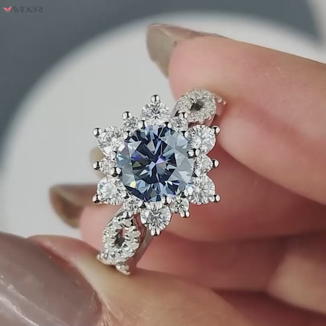 Halo ring setting with brilliant stones encircling the center for extra sparkle.

