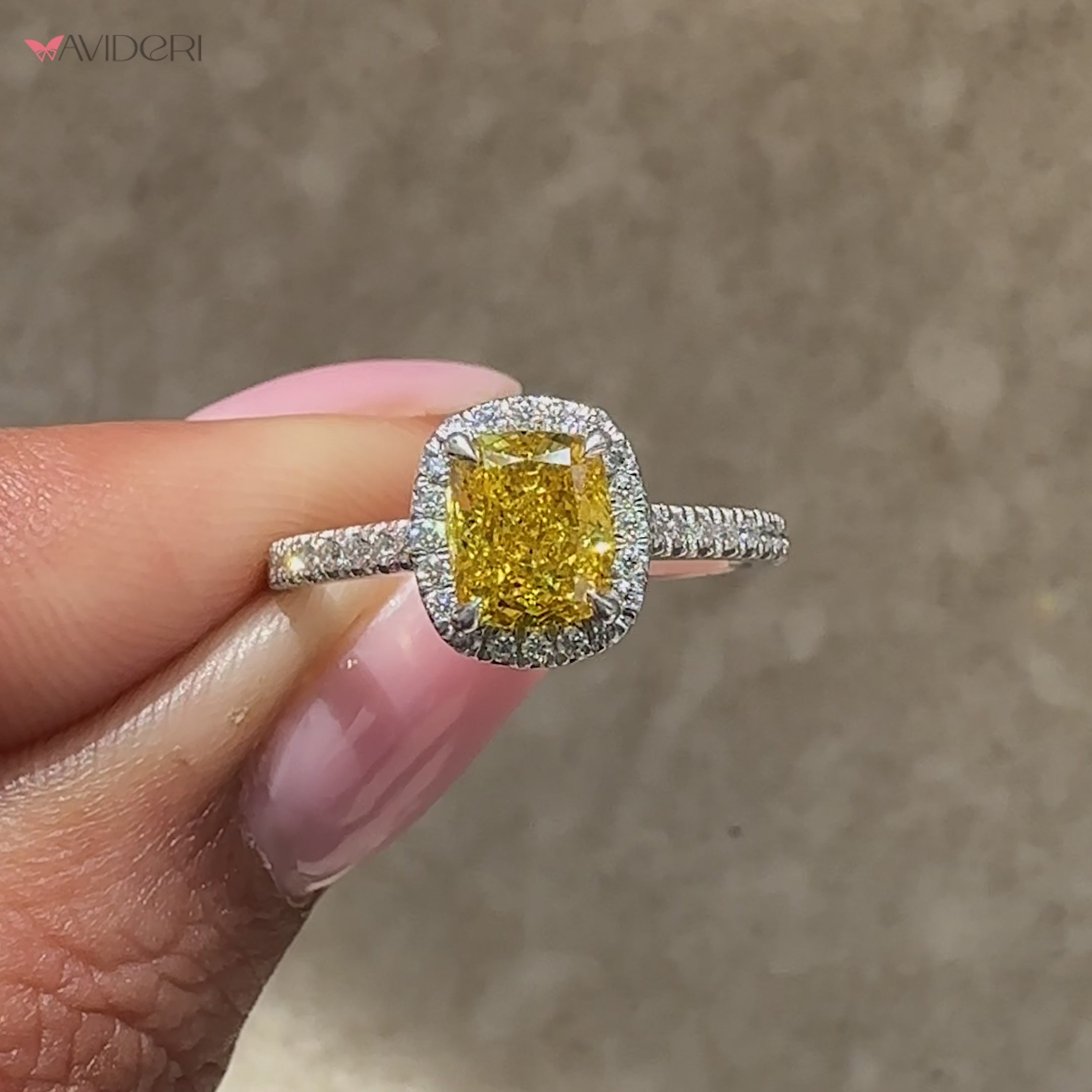 Elegant cushion cut diamond with halo design showcasing timeless beauty. 