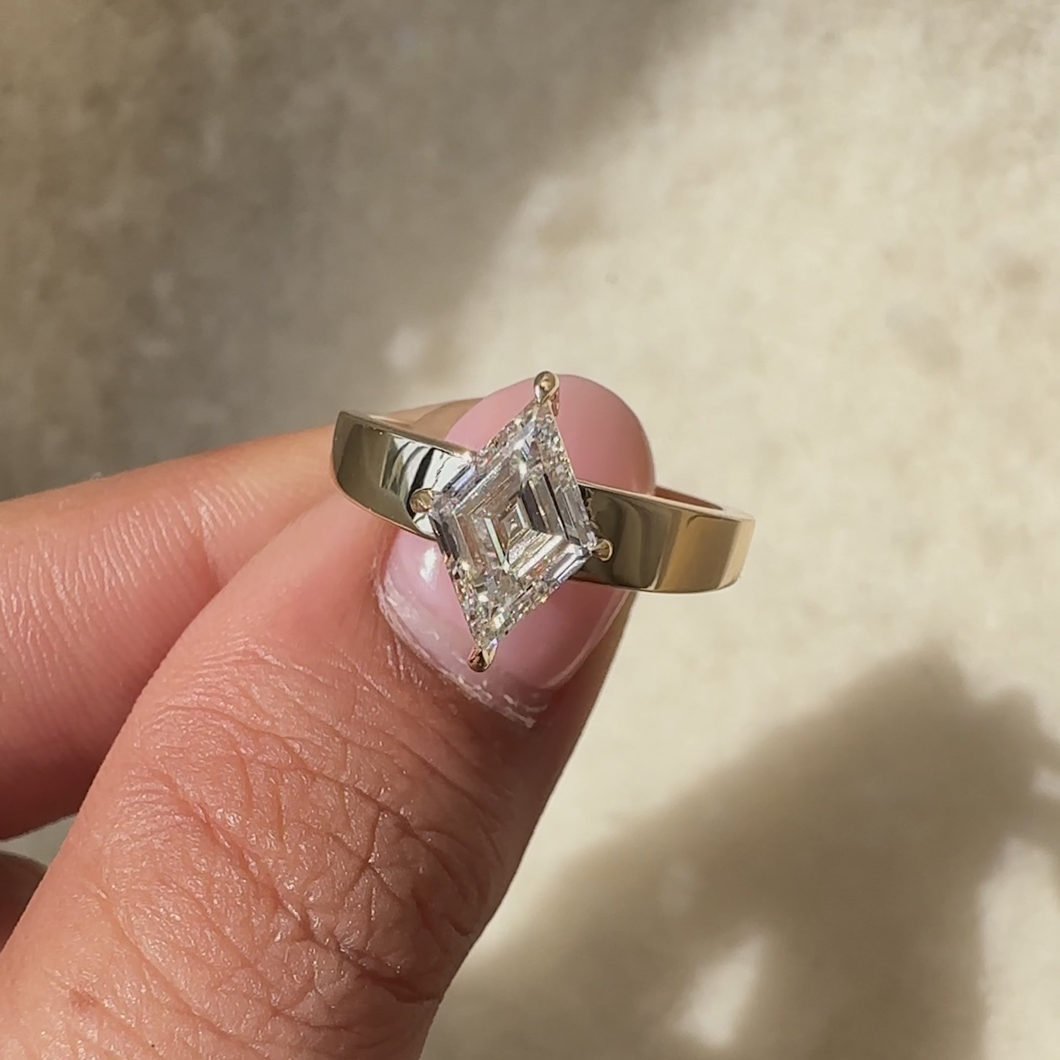 Avideri ring with solitaire engagement ring.