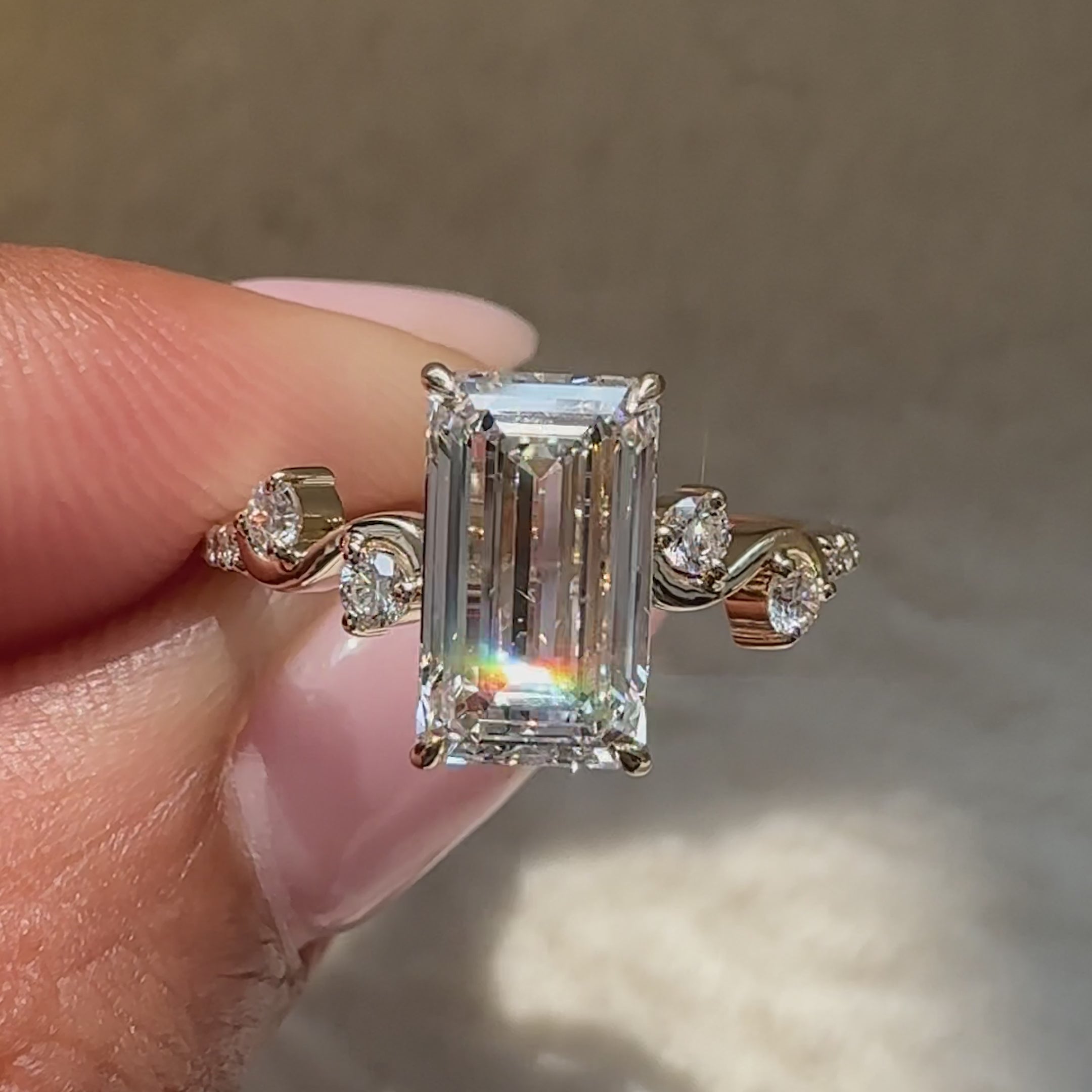 Marquise cut diamond ring with round diamond pave.
