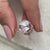 Anniversary gifts for her, featuring a round diamond ring set in yellow gold for a traditional look.