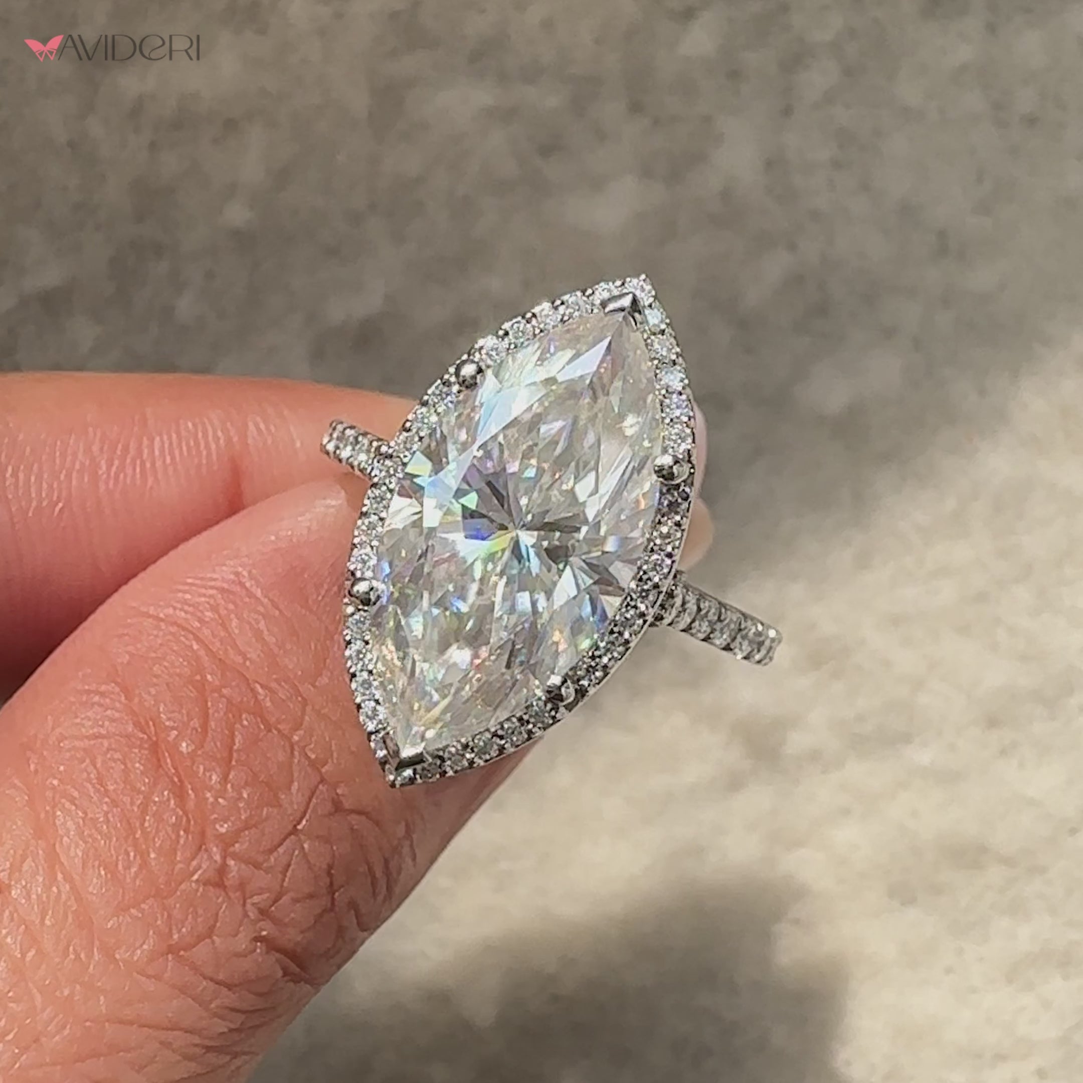Avideri marquise engagement ring with halo pave design.