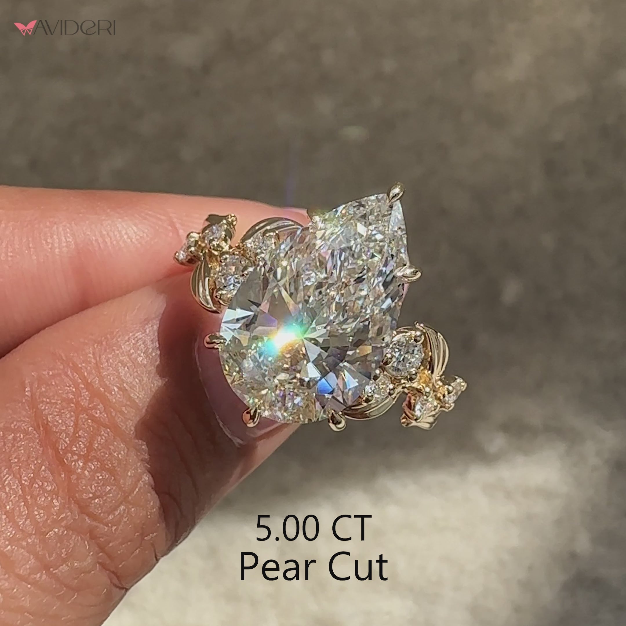 Pear cut diamond ring with elegant six claw prong setting.

