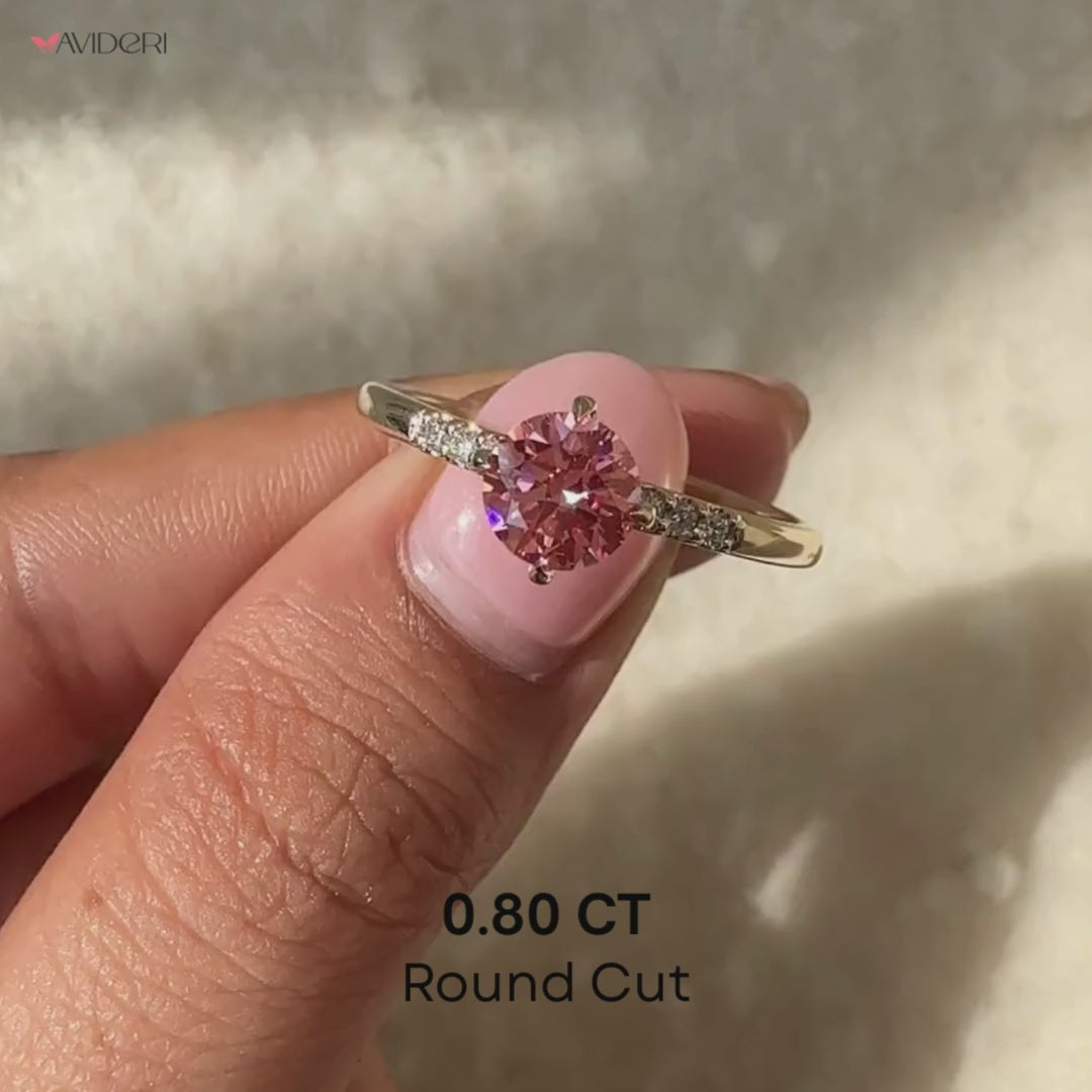 Round pink diamond engagement ring with Lab Grown Diamond certified stones.