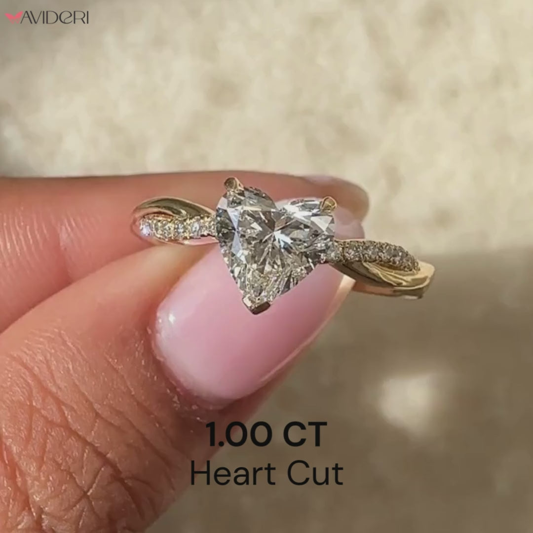 Avideri ring with heart cut diamond.