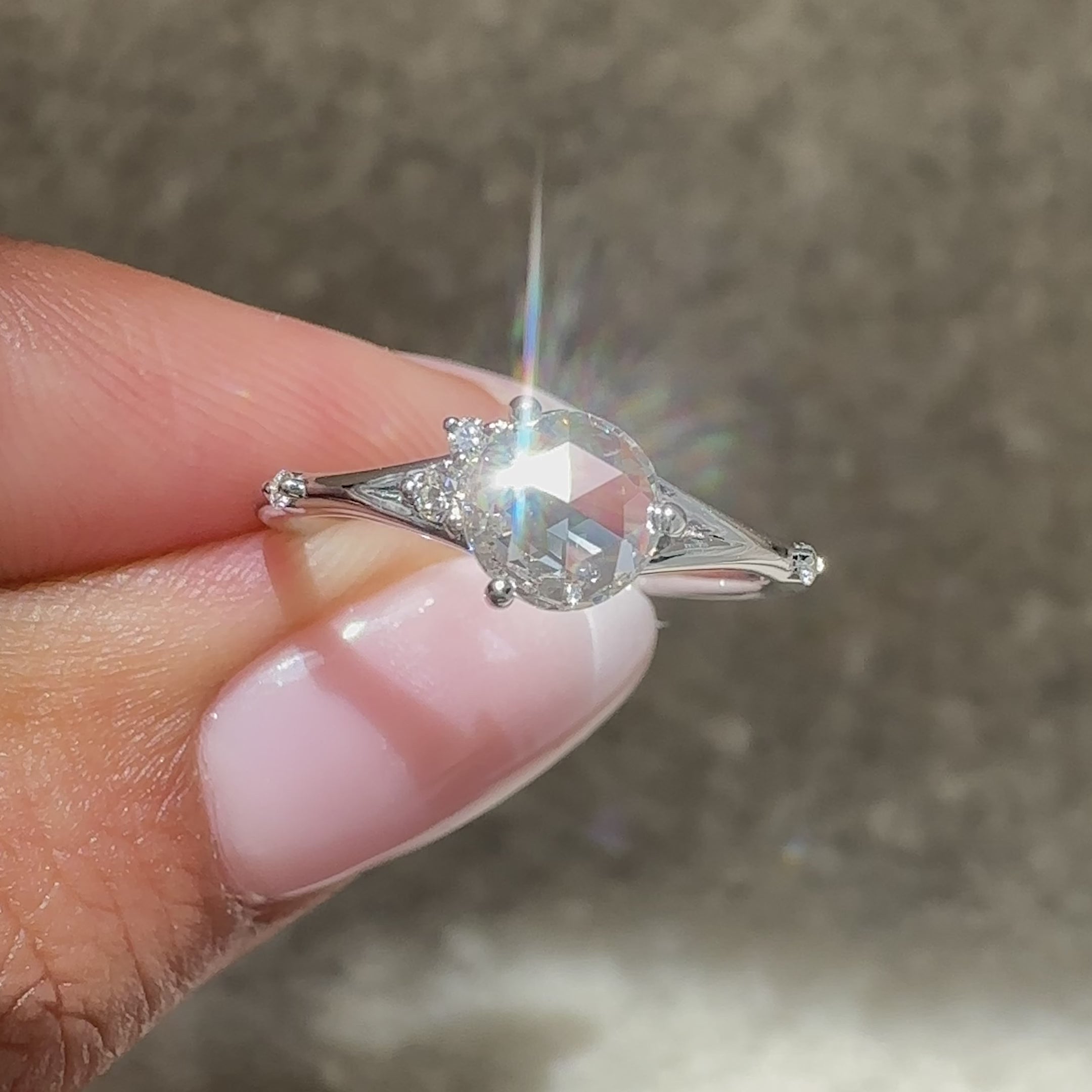 Handmade five stone ring with split shank.