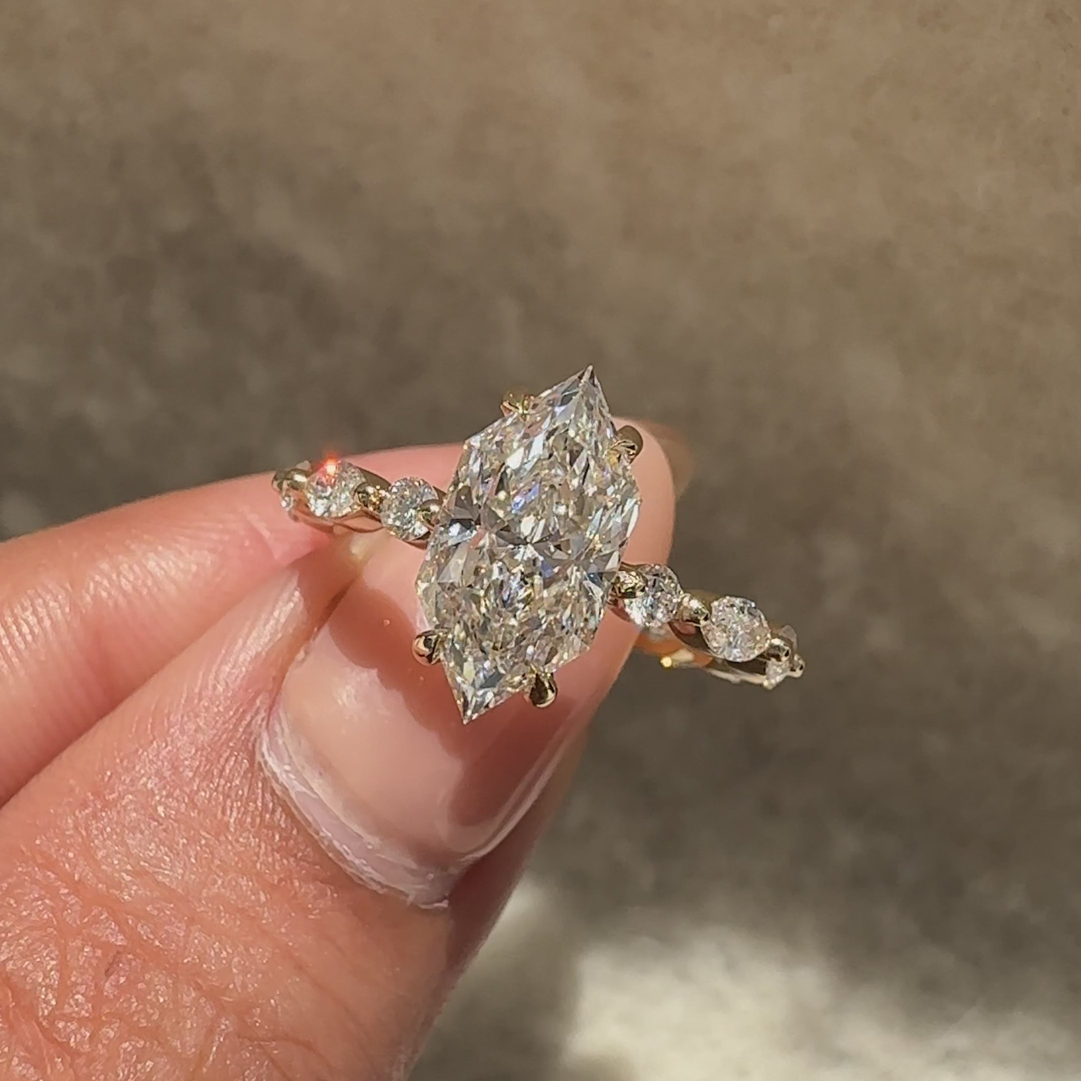 Dutch marquise diamond ring with four claw prongs.
