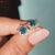 Handmade jewelry with cyan blue cluster flower earrings in yellow gold.