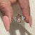 Avideri ring featuring lab grown diamonds and five stones.
