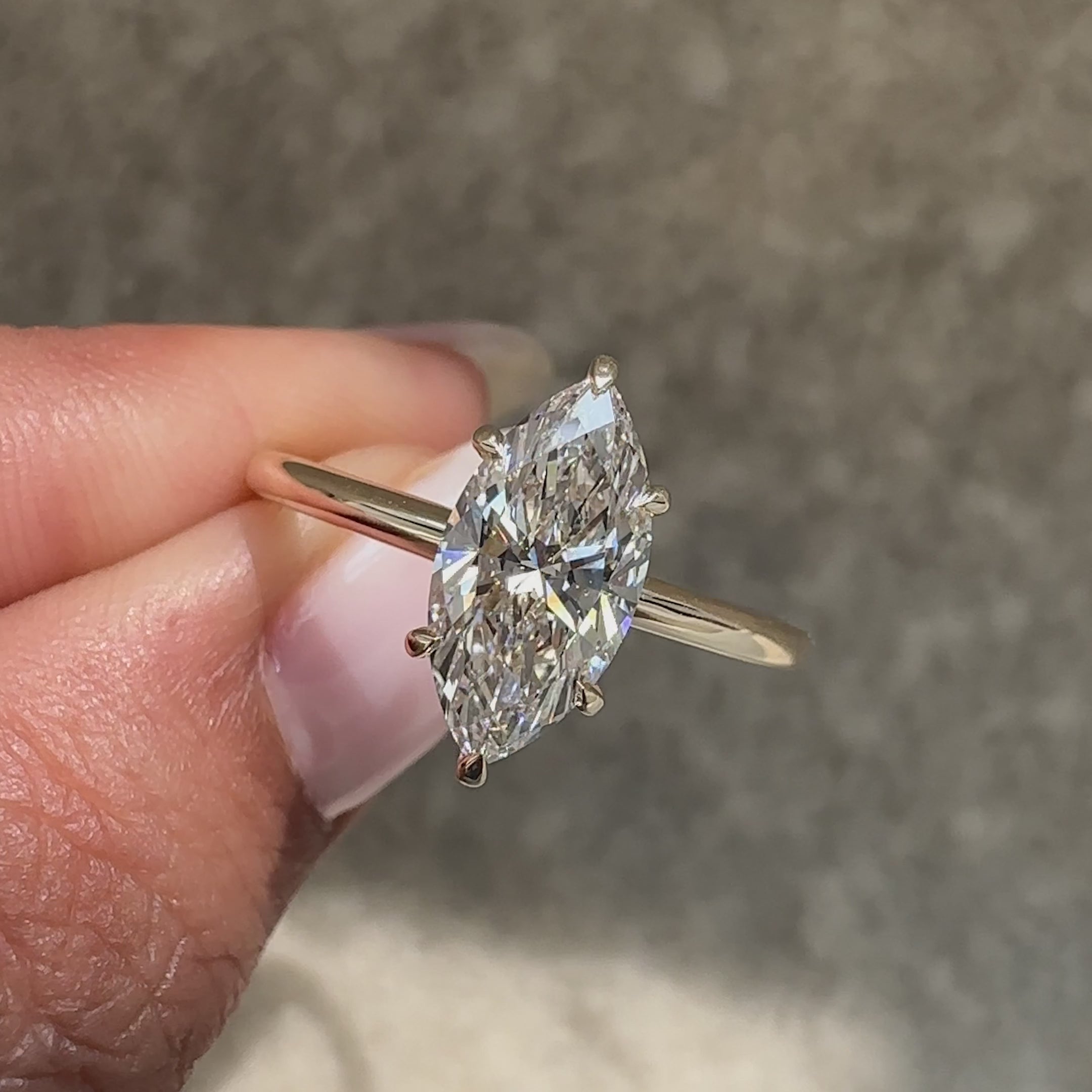 Marquise cut solitaire diamond ring with fine craftsmanship.
