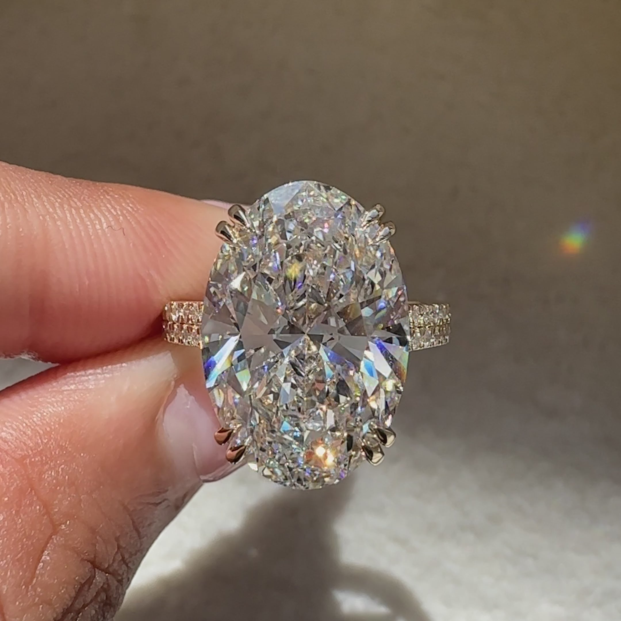 IGI certified oval diamond ring with double prongs.
