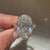 IGI certified oval diamond ring with double prongs.
