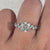 Avideri engagement ring featuring a round and marquise diamond combination, set in a four prong setting.