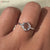 rose round cut engagement ring showcasing elegance in white gold
