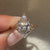 Marquise engagement ring with ornate six prong style.