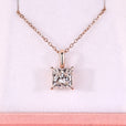 Princess cut diamond pendant with rose gold pendant.