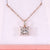 Princess cut diamond pendant with rose gold pendant.