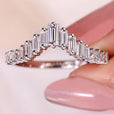 Half eternity wedding band with clean prong setting.
