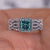 Cyan Blue Princess Cut Moissanite shines brightly in the engagement ring.