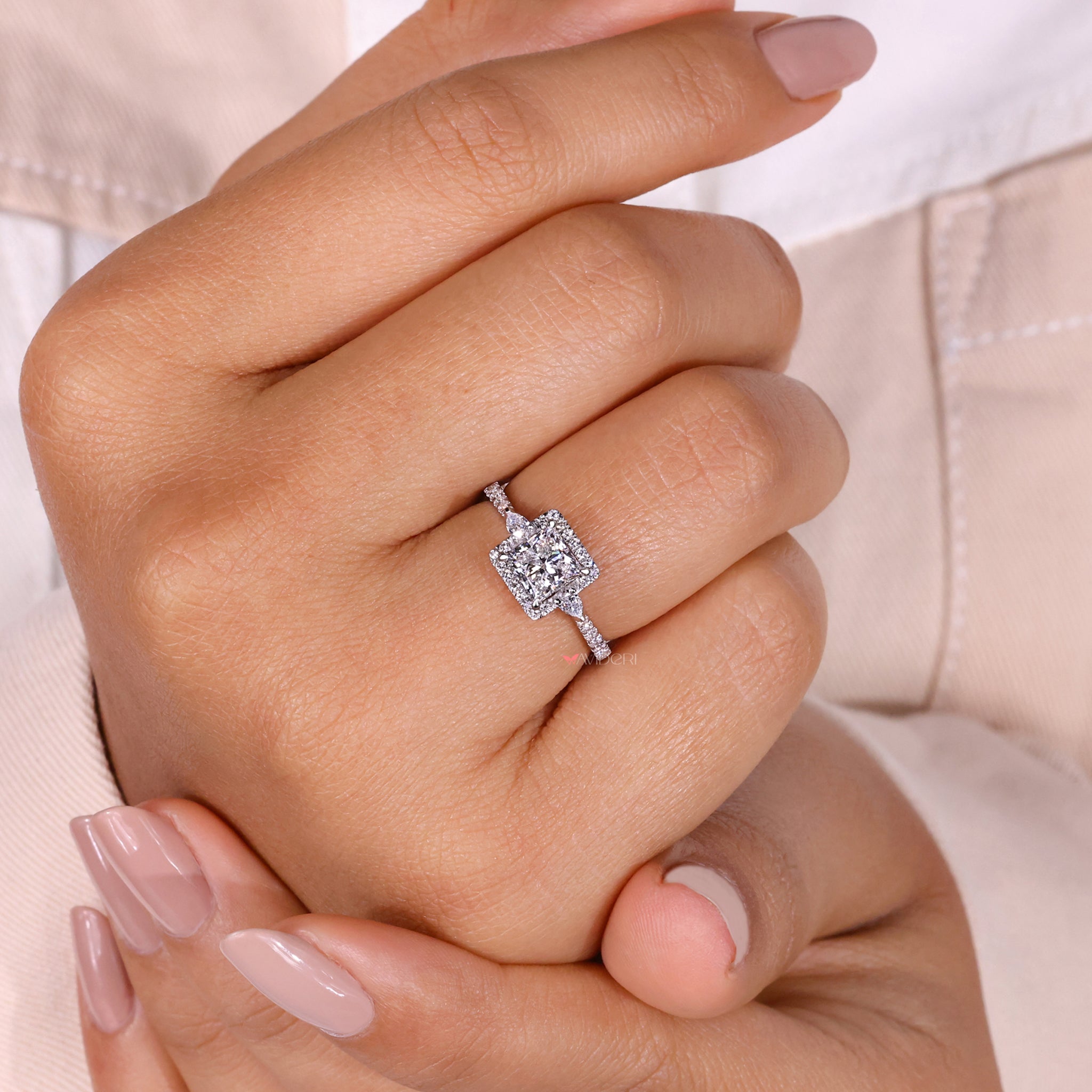 Princess ring showcasing a stunning a princess cut diamond, ideal for a classic yet sophisticated look.
