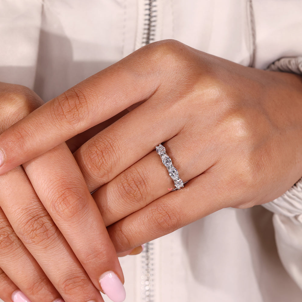 East to west setting with side halo wedding band.
