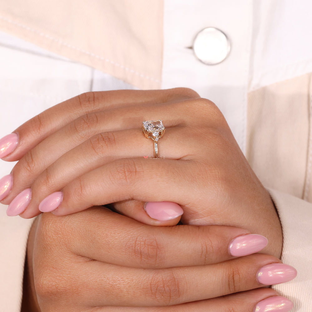 Handmade ring featuring radiant cut diamonds for a personalized touch.
