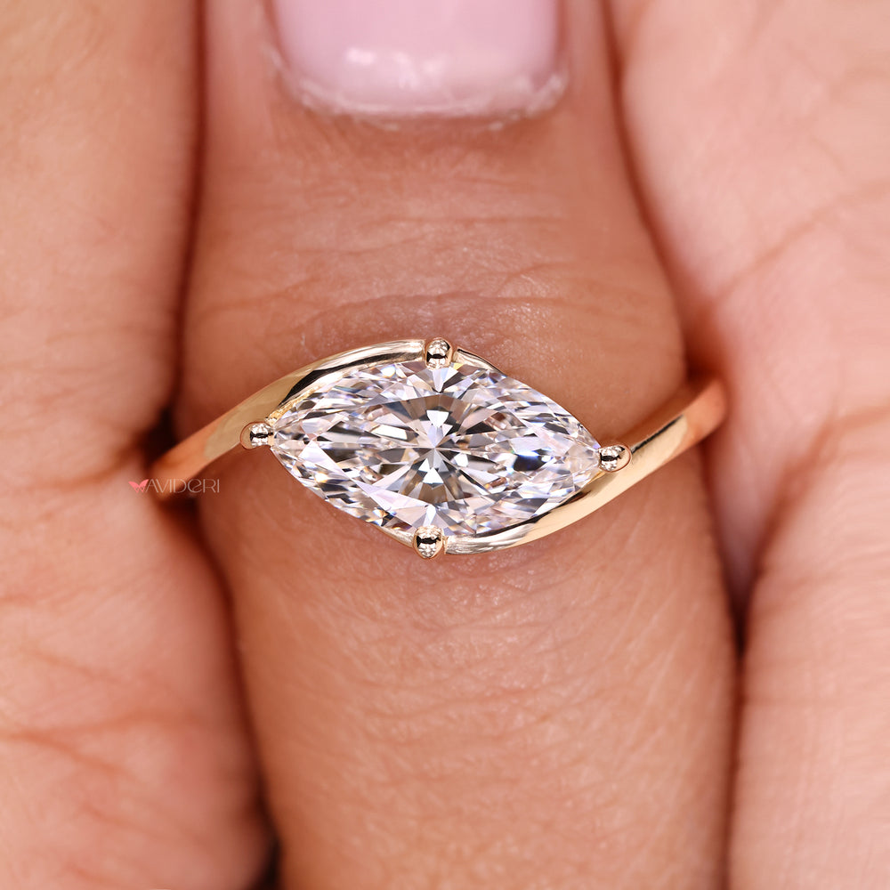Marquise diamond ring with solitaire design.

