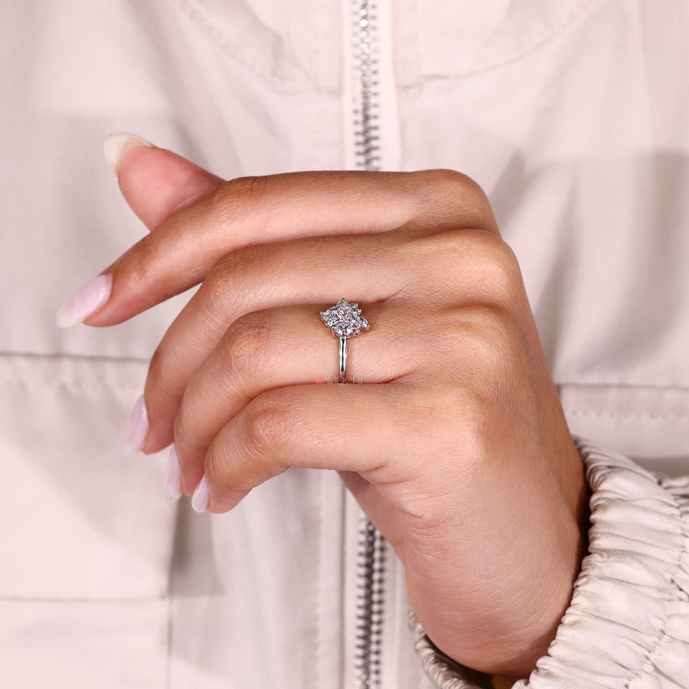 Lab grown oval diamond ring with prong setting.
