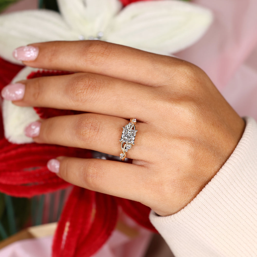 Lab grown princess cut diamond ring with vine details.
