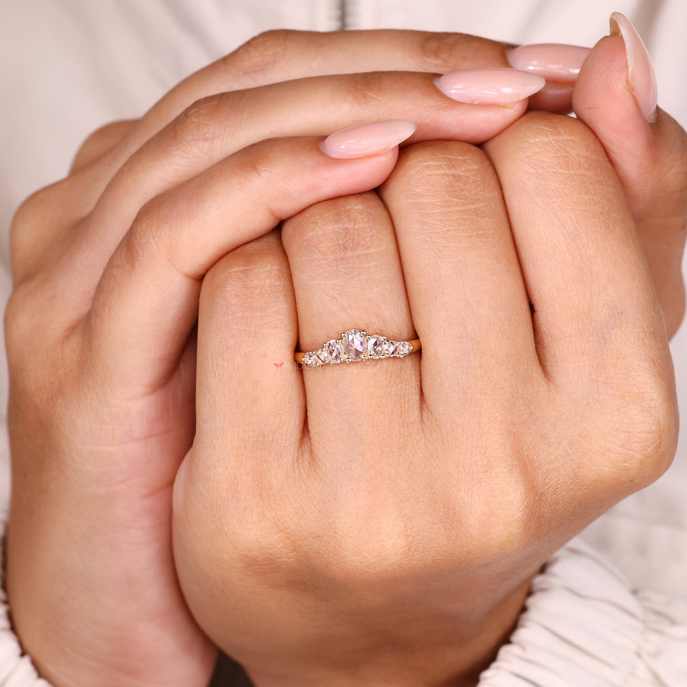 Oval rose cut band with round rose diamonds.
