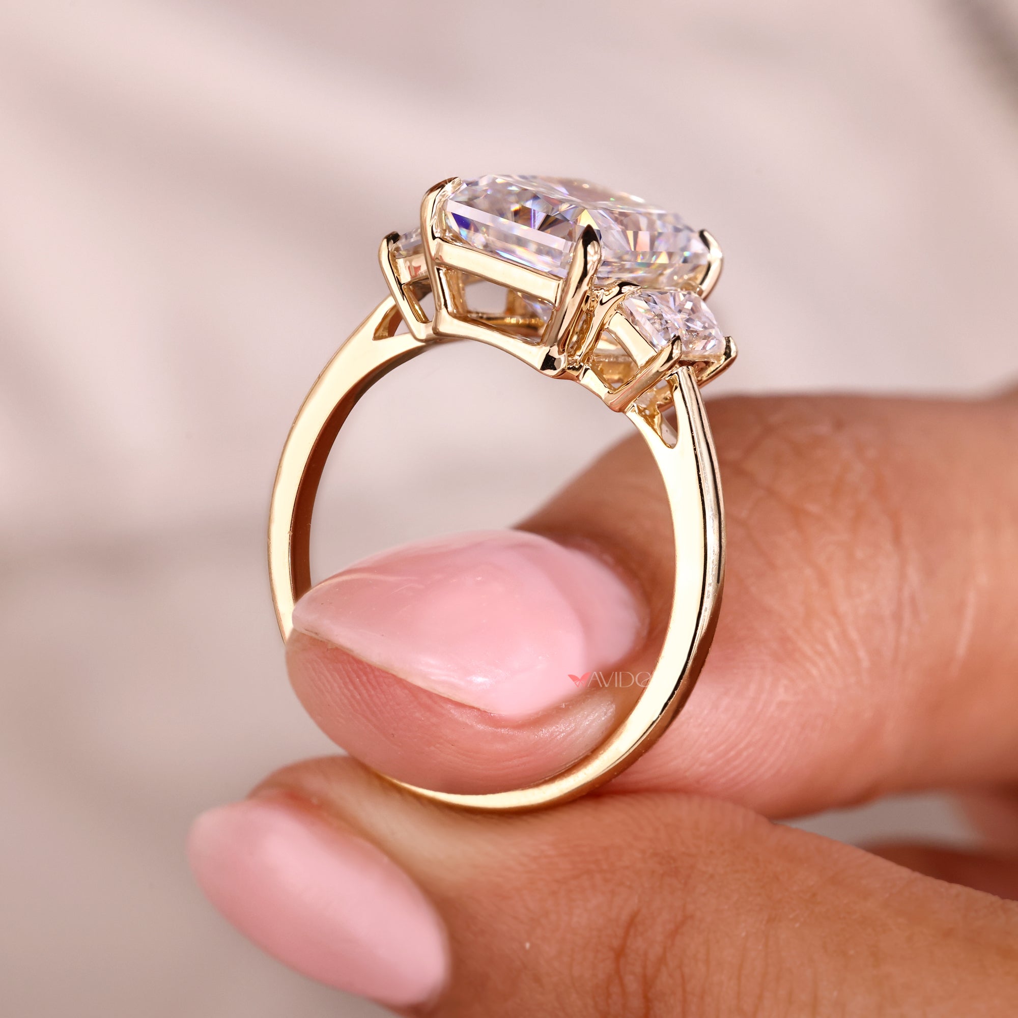 Cathedral setting ring with radiant cut moissanite.