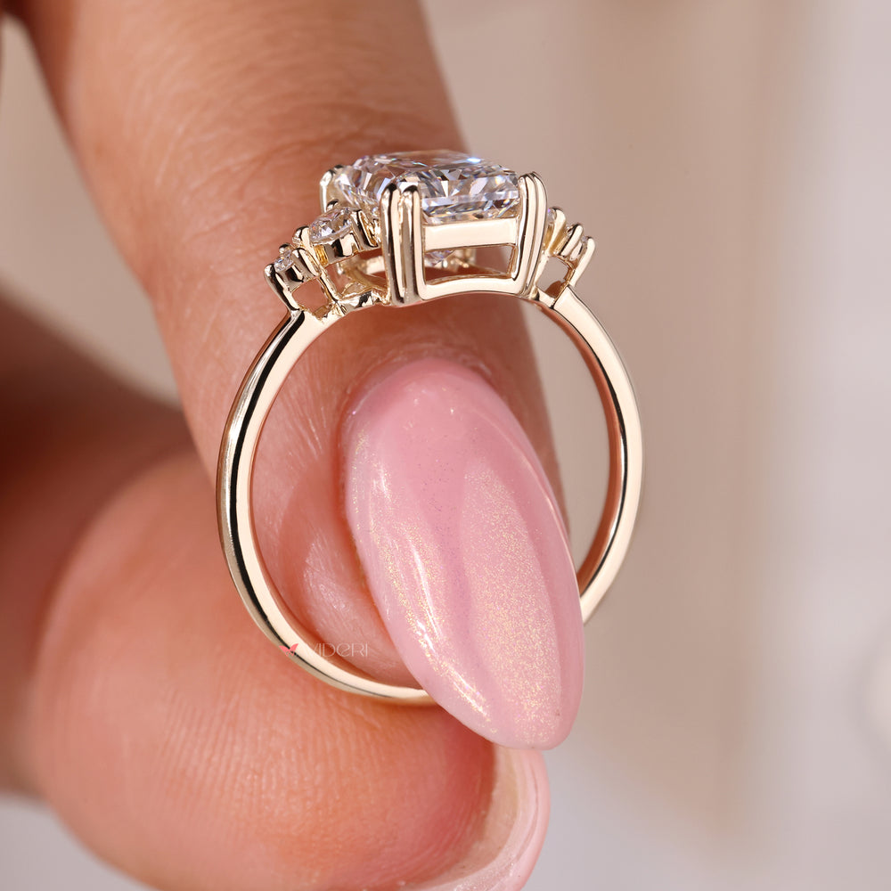 Yellow gold 5 diamond ring featuring a radiant cut diamond for added sparkle.
