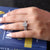 Radiant cut moissanite engagement ring and wedding band set.