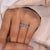 Halo half eternity band in a timeless style.
