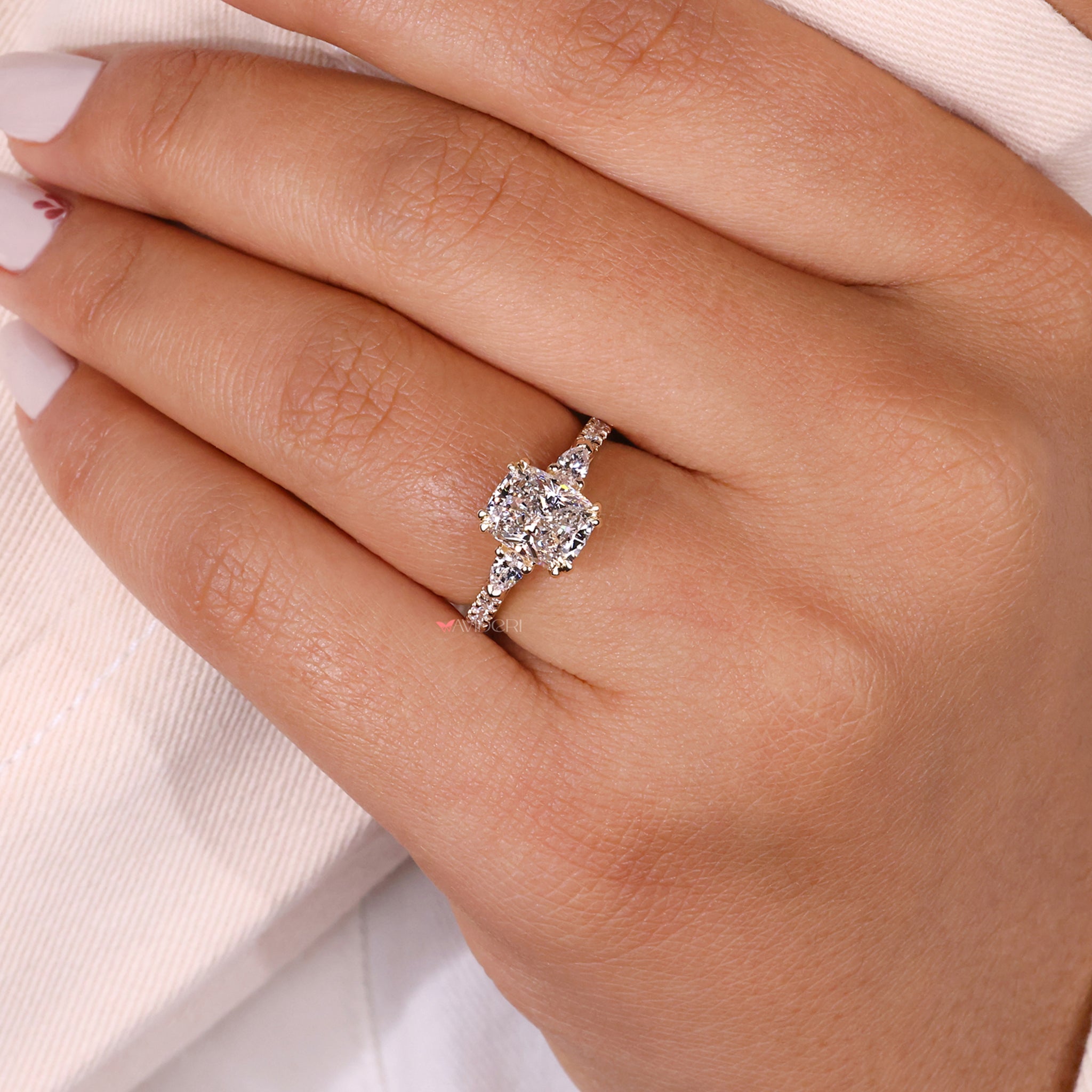 claw prong cushion cut engagement ring
