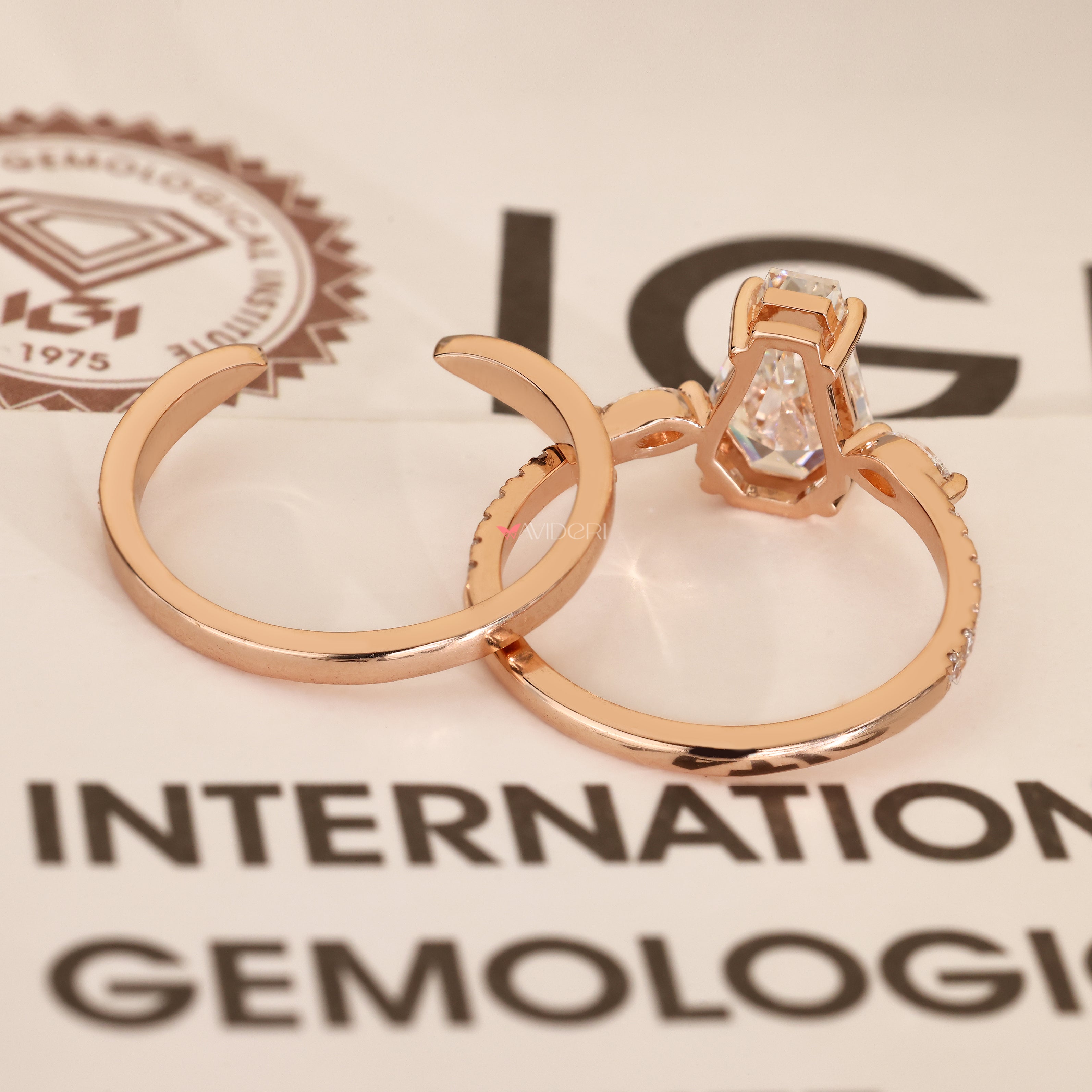Lab grown coffin diamond ring with pave details.
