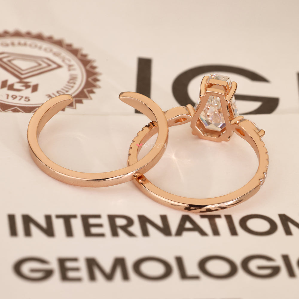 Lab grown coffin diamond ring with pave details.
