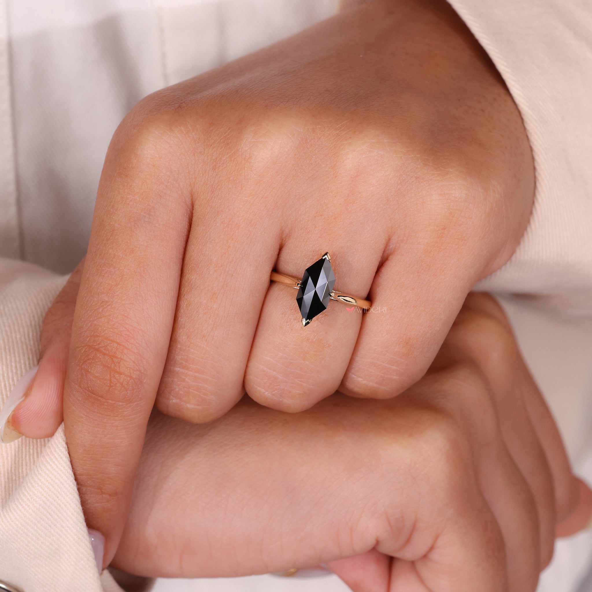 A vintage-inspired Dutch marquise engagement ring with a cathedral setting.
