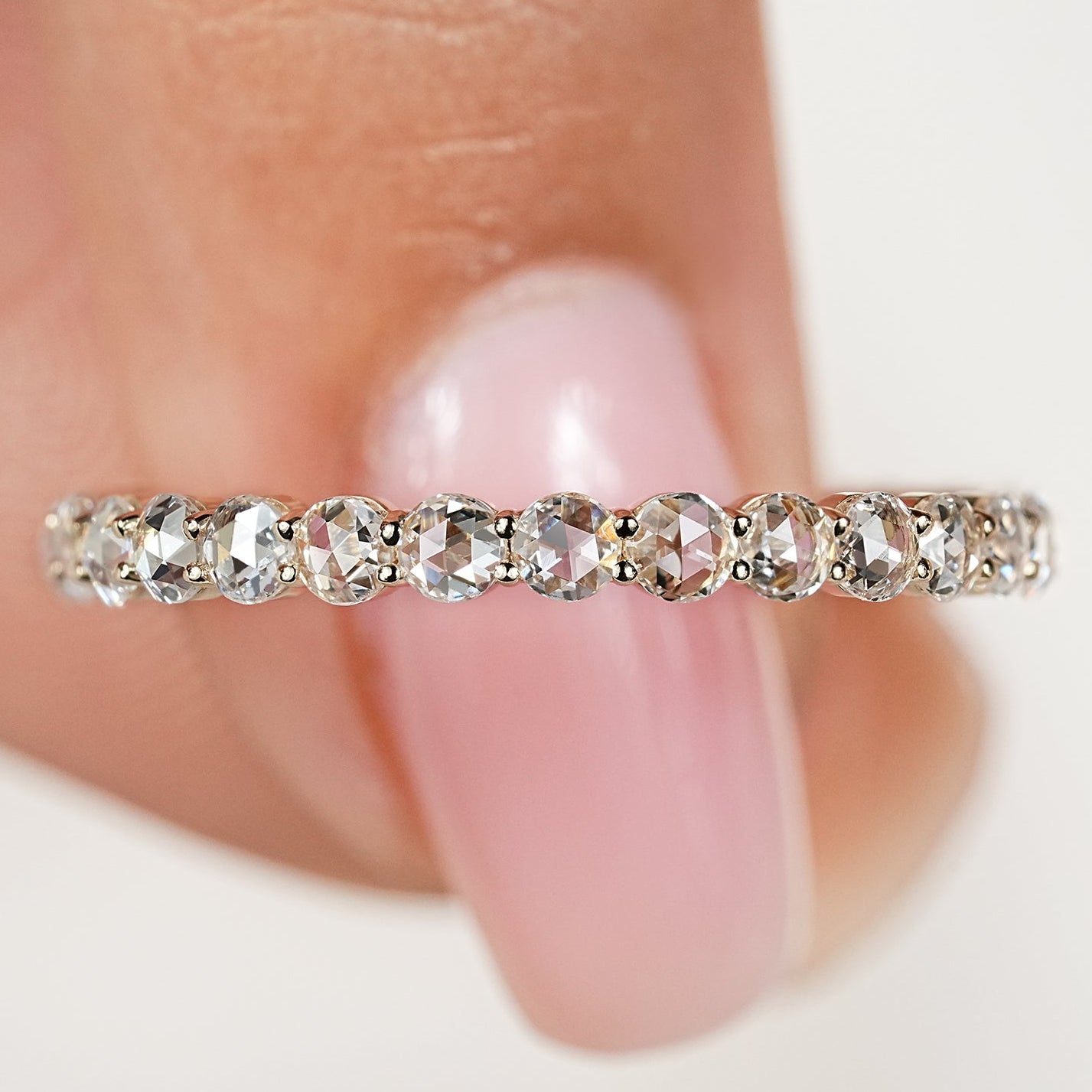Round rose diamond eternity wedding band with prong setting
