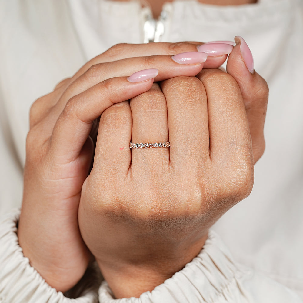 Handmade eternity band with round rose diamond accents
