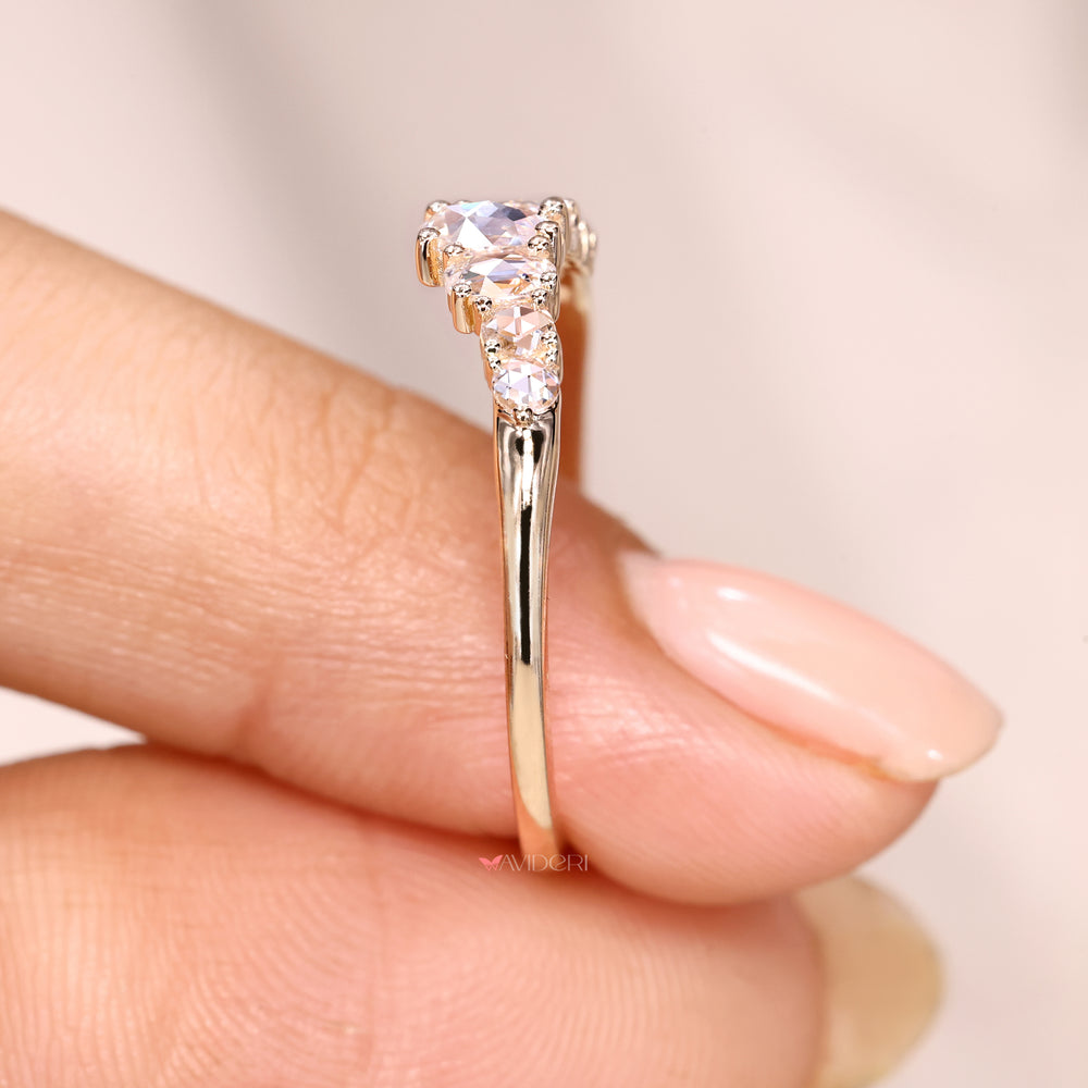 Half eternity diamond band with prong setting.

