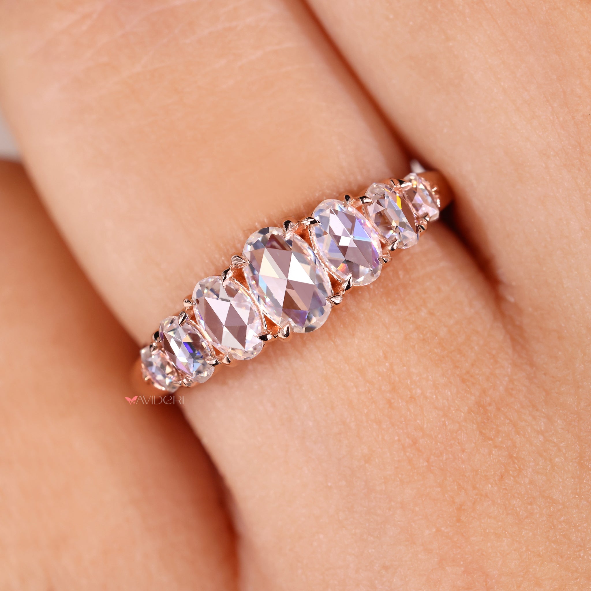 Oval rose cut wedding band with seven stone design for a unique look.