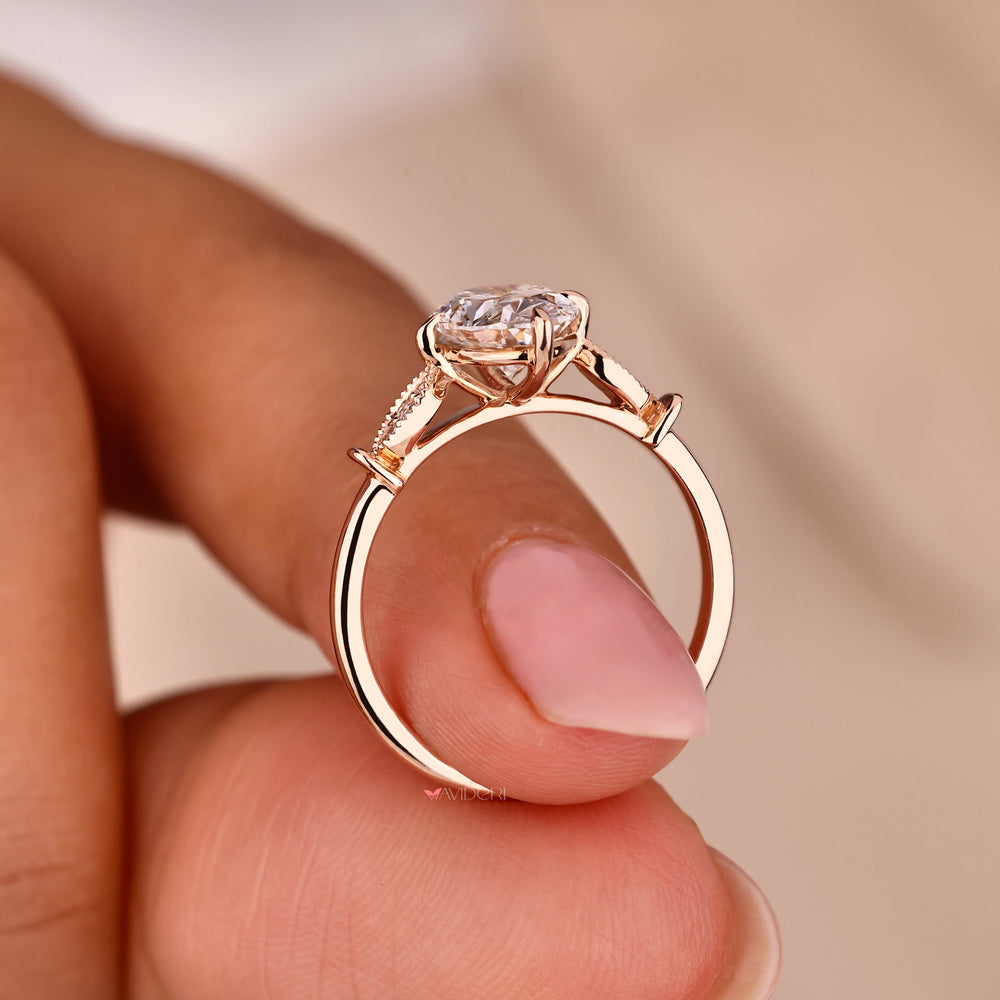 Handmade ring featuring a vintage engagement ring design with an oval cut engagement ring setting.
