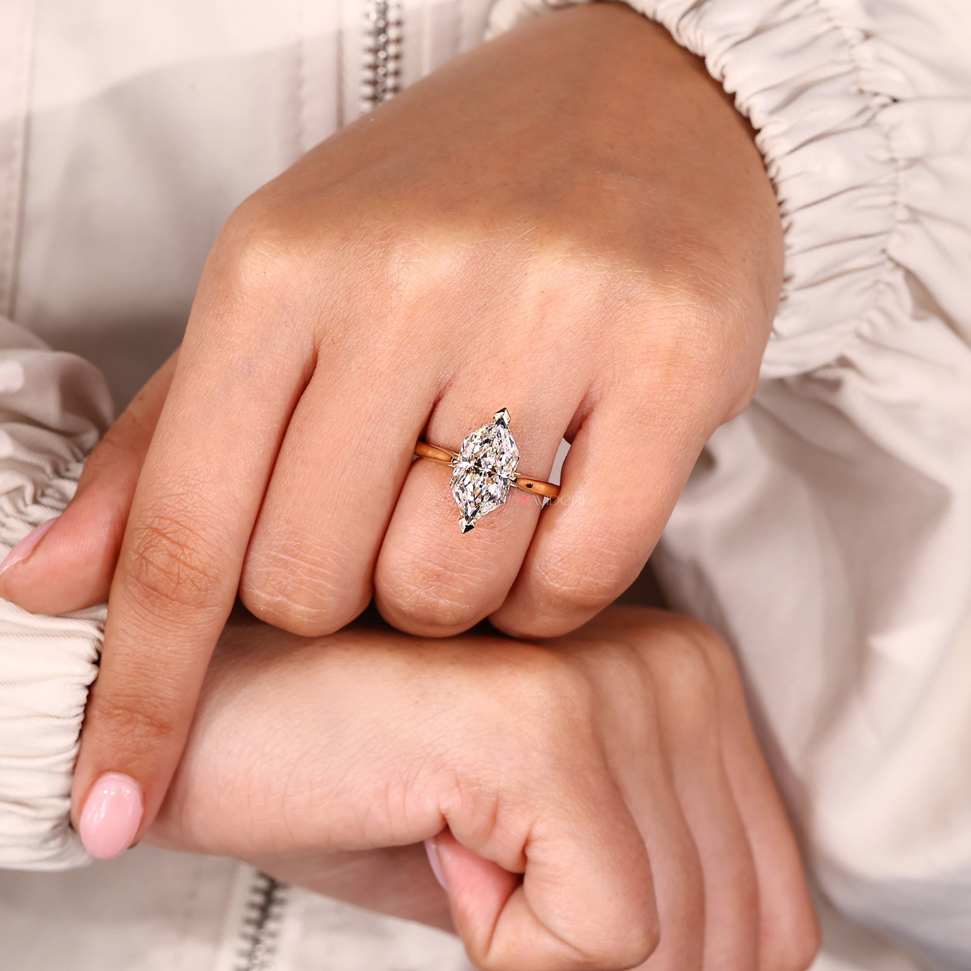 Tapered shank ring with round lab grown diamond and handmade design.