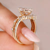 Round cut side stone with distance pave setting.